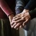 Closeup of hands of group of seniors